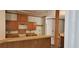 Kitchen features wood cabinets, tile countertops and flooring at 3112 Santee River Rd, Saint Stephen, SC 29479
