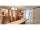 Open kitchen with breakfast bar and wood cabinets at 3112 Santee River Rd, Saint Stephen, SC 29479