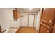 Laundry room with sink and built in cabinets at 3112 Santee River Rd, Saint Stephen, SC 29479