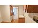 Laundry room with utility sink and access to other rooms at 3112 Santee River Rd, Saint Stephen, SC 29479