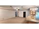 Spacious living room with ceiling fan and carpet flooring at 3112 Santee River Rd, Saint Stephen, SC 29479