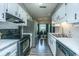 Modern kitchen with white cabinets and stainless steel appliances at 314 Heber Rd, Summerville, SC 29485