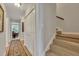 Bright hallway with hardwood floors and access to upstairs at 426 Forsythia Ave, Summerville, SC 29483