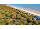 Aerial view showing home's location near beach and other houses at 456 Vetch Ct, Kiawah Island, SC 29455