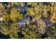 Aerial view showing home's private setting and lush landscaping at 456 Vetch Ct, Kiawah Island, SC 29455