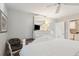 Bright bedroom with a white bed frame, a chair and an ensuite bathroom at 456 Vetch Ct, Kiawah Island, SC 29455