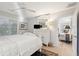 Comfortable bedroom with a white dresser, light walls, and access to another room at 456 Vetch Ct, Kiawah Island, SC 29455