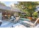 Large deck with seating area, grill, and access to the backyard at 456 Vetch Ct, Kiawah Island, SC 29455