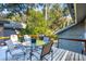 Outdoor deck with seating area and grill at 456 Vetch Ct, Kiawah Island, SC 29455