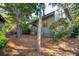 Side view of house with deck and surrounding trees at 456 Vetch Ct, Kiawah Island, SC 29455