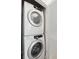 Convenient laundry room with stackable washer and dryer at 456 Vetch Ct, Kiawah Island, SC 29455