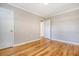 Empty bedroom with hardwood floors and neutral walls at 4632 Holmes Ave, North Charleston, SC 29405