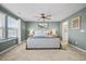 Large main bedroom featuring a neutral color scheme and plush carpeting at 466 Trotters Ln, Moncks Corner, SC 29461