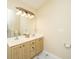 Double vanity bathroom with light beige cabinets at 7011 Windmill Creek Rd, Charleston, SC 29414