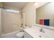 Small bathroom with shower/tub combo and single vanity at 7011 Windmill Creek Rd, Charleston, SC 29414