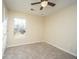 Bedroom with a ceiling fan and window overlooking water at 7011 Windmill Creek Rd, Charleston, SC 29414