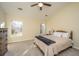 Bedroom with two windows and a ceiling fan at 7011 Windmill Creek Rd, Charleston, SC 29414
