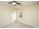 Bedroom with a ceiling fan and large window at 7011 Windmill Creek Rd, Charleston, SC 29414