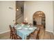 Spacious dining room, hardwood floors, and access to kitchen and stairs at 7011 Windmill Creek Rd, Charleston, SC 29414