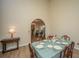 Bright dining room with hardwood floors and view into kitchen at 7011 Windmill Creek Rd, Charleston, SC 29414