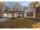 Two-story house with two-car garage and landscaped yard at 7011 Windmill Creek Rd, Charleston, SC 29414