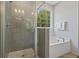 Modern bathroom with walk-in shower and soaking tub at 768 Maynard Ln, Summerville, SC 29486