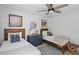 Bright bedroom with two twin beds, dresser, and ceiling fan at 768 Maynard Ln, Summerville, SC 29486