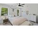 Bedroom with white dresser and ceiling fan at 768 Maynard Ln, Summerville, SC 29486