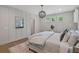 Spacious main bedroom with large bed and wood floors at 768 Maynard Ln, Summerville, SC 29486