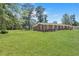 Large backyard with a grassy area and mature trees at 1106 Old Highway 6, Cross, SC 29436