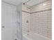 Bathroom with white subway tile shower and built-in shelving at 1106 Old Highway 6, Cross, SC 29436