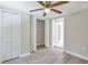 Bedroom with ceiling fan, wood-look floors, and walk-in closet at 1106 Old Highway 6, Cross, SC 29436