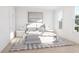 Spacious bedroom with large windows, plush bedding and modern decor at 1150 Valdosta St # 404, North Charleston, SC 29405