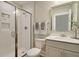 Clean bathroom with a walk-in shower, white subway tiles and modern vanity at 117 Crosscut Ln, Summerville, SC 29486