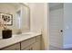 Small bathroom with quartz countertop, single sink, and frameless mirror at 117 Crosscut Ln, Summerville, SC 29486