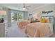 Charming bedroom with two twin beds, featuring a neutral color palette, and natural light at 117 Crosscut Ln, Summerville, SC 29486