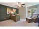 Spacious home office with wood desk and seating area at 117 Crosscut Ln, Summerville, SC 29486