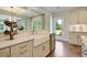 Kitchen features farmhouse sink and opens to Gathering room at 117 Crosscut Ln, Summerville, SC 29486