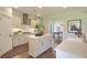 Modern kitchen with island, stainless steel appliances, and hardwood floors at 117 Crosscut Ln, Summerville, SC 29486