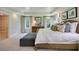 Main bedroom with tray ceiling, large windows, and walk-in closet at 117 Crosscut Ln, Summerville, SC 29486