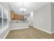 Kitchen with wood cabinets and tile floor at 117 Venezia Ct, Ladson, SC 29456