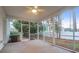 Spacious screened porch with view of backyard at 117 Venezia Ct, Ladson, SC 29456