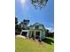 White two-story home with a front porch and lush green lawn at 1289 Hamlin Rd, Mount Pleasant, SC 29466