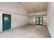 Bonus room with french doors leading to the back and a green door to the side at 143 Beltree Ct, Moncks Corner, SC 29461