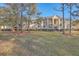 Attractive apartment building exterior with balconies and lush landscaping at 1600 Long Grove Dr # 914, Mount Pleasant, SC 29466
