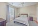 Cozy bedroom with plush carpet, ceiling fan, and ample natural light at 1600 Long Grove Dr # 914, Mount Pleasant, SC 29466