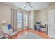 Well-lit home office with hardwood floors, large windows, and a workspace at 1600 Long Grove Dr # 914, Mount Pleasant, SC 29466