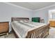 Main bedroom with wood furniture and ensuite at 1613 Cavanaugh Rd, Walterboro, SC 29488