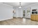 Bright dining area with access to a deck and neutral tile floors at 1613 Cavanaugh Rd, Walterboro, SC 29488