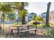 Community picnic table with grill, near a pond and houses at 1643 Cultivation Lane Dr # 450, Mount Pleasant, SC 29466